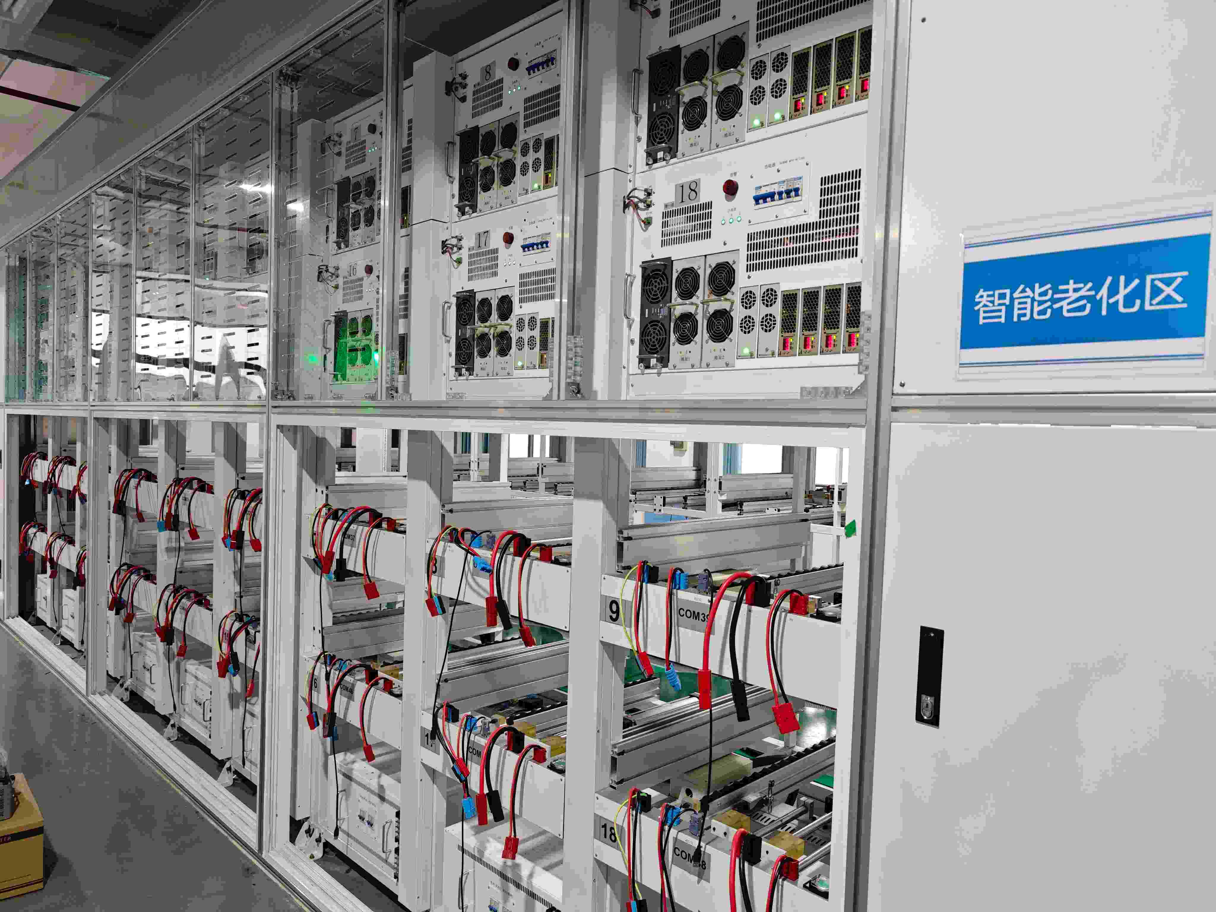 Solar inverters undergoing continuous aging and reliability testing in the SNAT Solar factory test area.